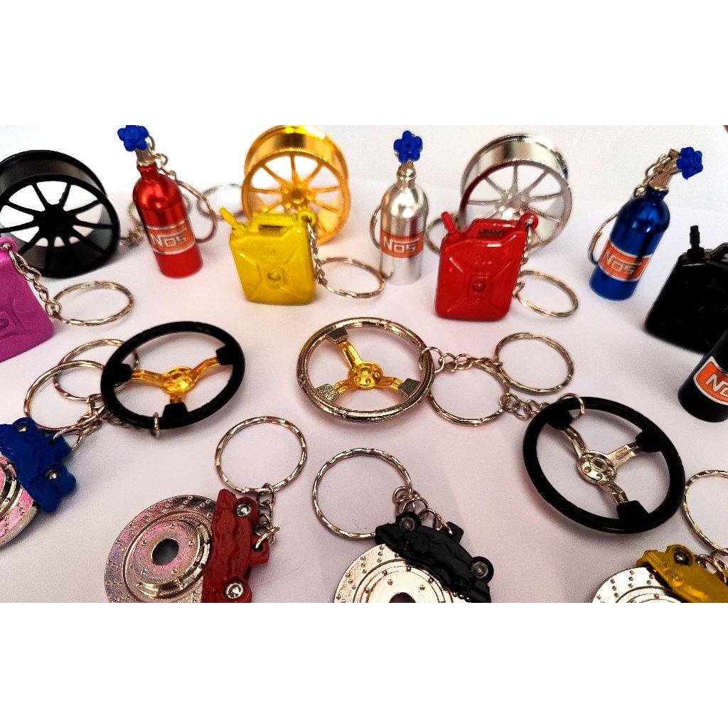 Chaveiros automotivos câmbio turbo volante cilindro nos roda em Oferta na Shopee