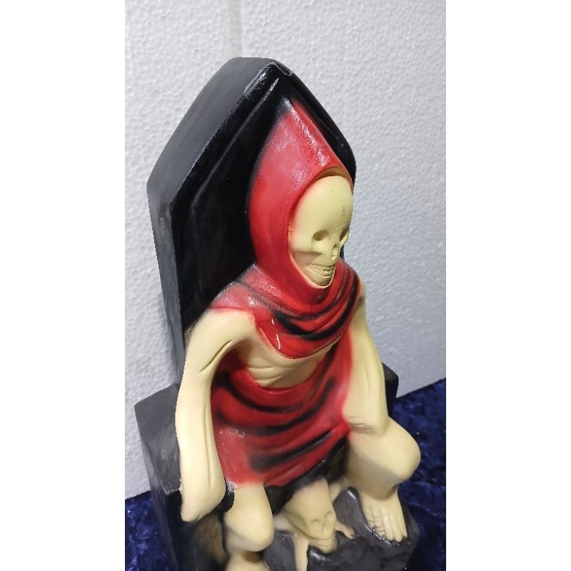 imagem do Exu Tatá caveira