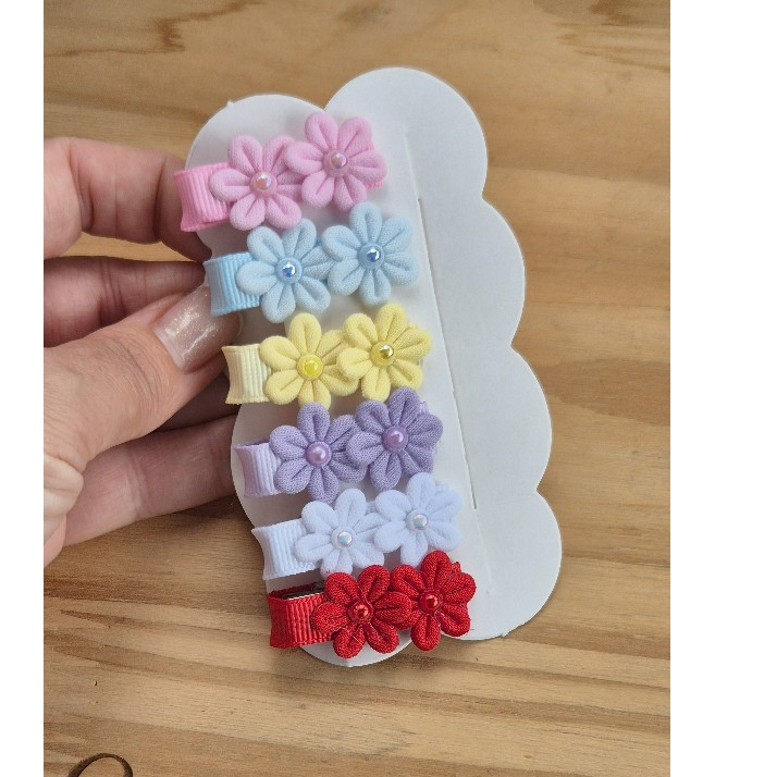 Mini kit laços de bebe 6 pecas encapado bico pato, laco flor, lacinho colorido. em Oferta na Shopee