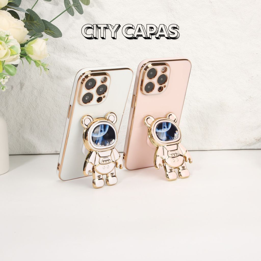 City Capas – Capinha iPhone 17 16 16E 15 PRO MAX PLUS com Suporte Astronauta Brilho Fofo Criativa em Oferta na Shopee