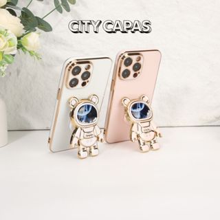 City Capas – Capinha iPhone 17 16 16E 15 PRO MAX PLUS com Suporte Astronauta Brilho Fofo Criativa em Oferta na Shopee