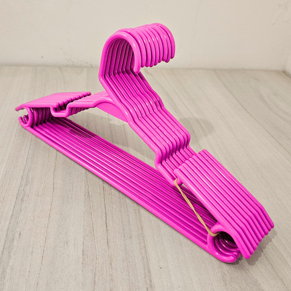 Atacado Cabide infantil 50 a 5 unidades Rosa baby + surpresa. em Oferta na Shopee