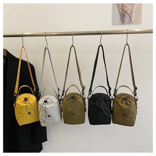 Casual bolsa de ombro bolsa de telefone móvel desporto nylon bolsa feminina bolsa de copo de água em Oferta na Shopee