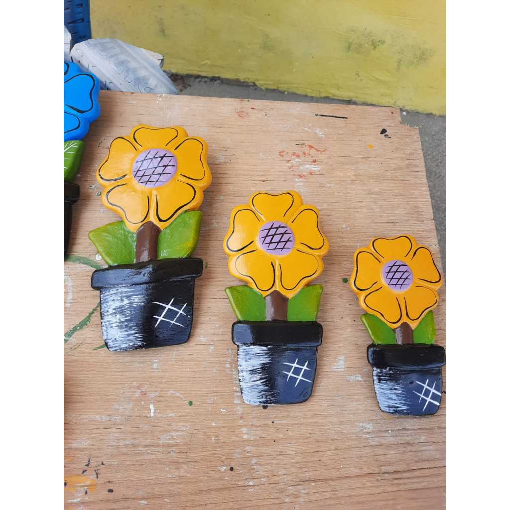 trio de flor de gesso e cimento....