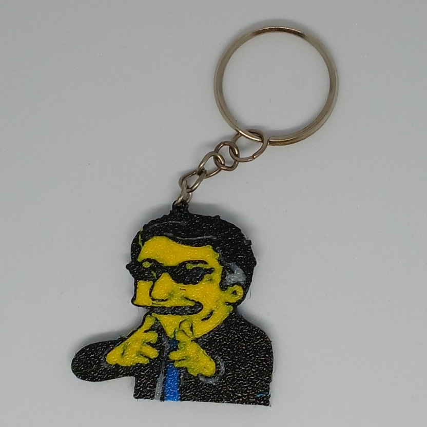 Chaveiro Bolsonaro estilo Simpsons com óculos preto