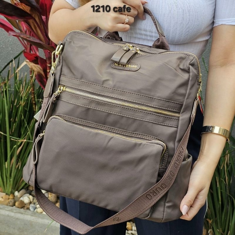 Mochila Pavão de Ouro Duas Alças Espaçosa Escola Faculdade Maternidade Original Nylon Impermeável 1210 em Oferta na Shopee