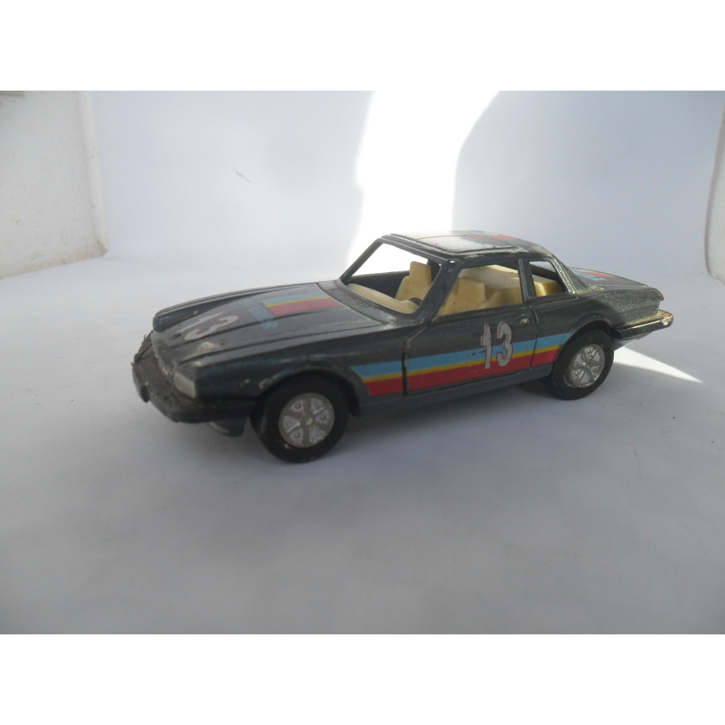 Com defeito na fricção e sem vidros - Miniatura Paraguai década de 80/90 número 13 turbo
