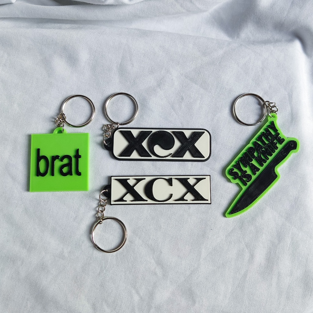 Charli XCX Chaveiros - XCX - BRAT *KITS COM DESCONTO *LEIA A DESCRICAO em Oferta na Shopee