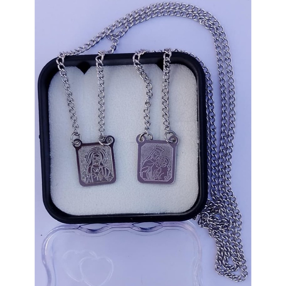 Escapulário de aço com N. Sra. Carmo con fundo fosco em Oferta na Shopee