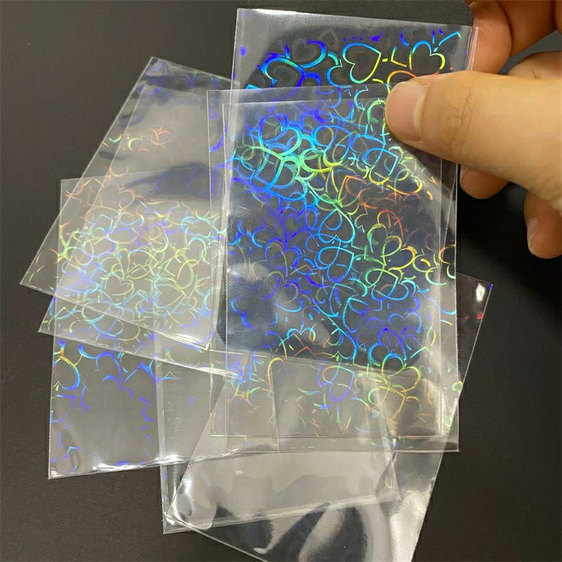 50 Unidades 65x90mm Sleeve Holográfico Coração Pokémon Magic Shield Games TCG Photocard Protetor de Cartas em Oferta na Shopee
