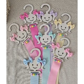 Cabide Porta laço organizador de laços infantil boneca em Oferta na Shopee
