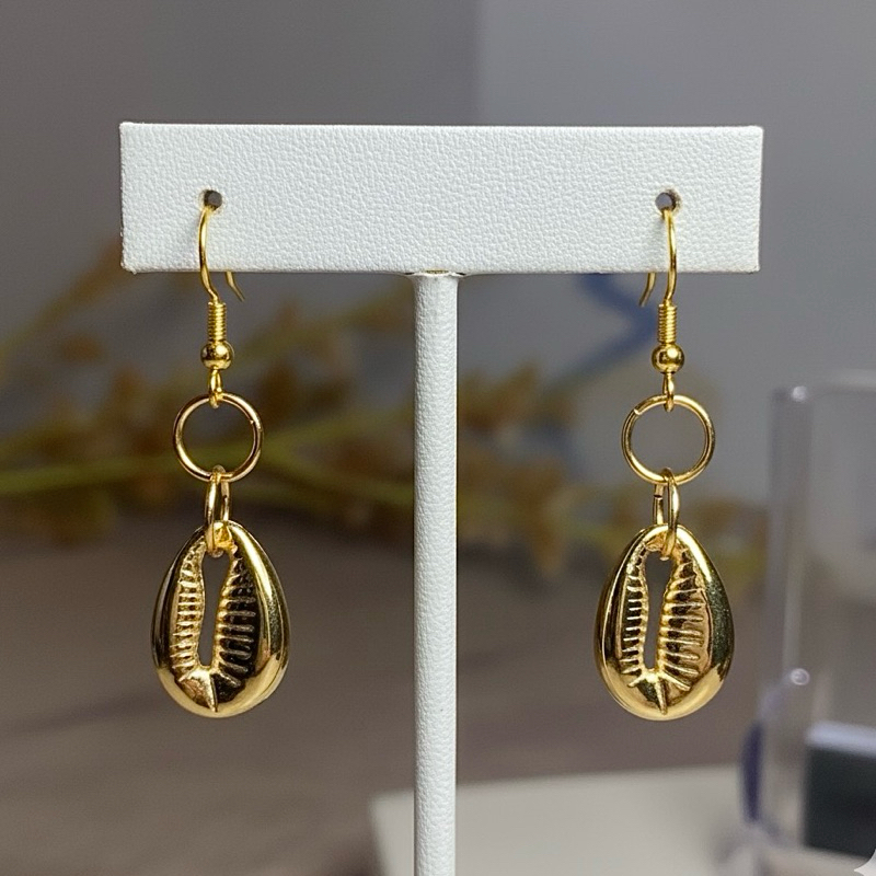 Brinco de Buzios Dourado: Onde Comprar | BuscaProdutos