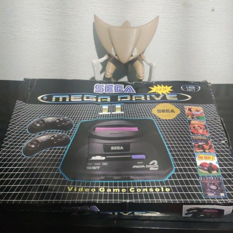 Mega drive Chinês - na caixa - 5 games na memória - 2 controles de 6 botões- AV integrado - Leia a descrição