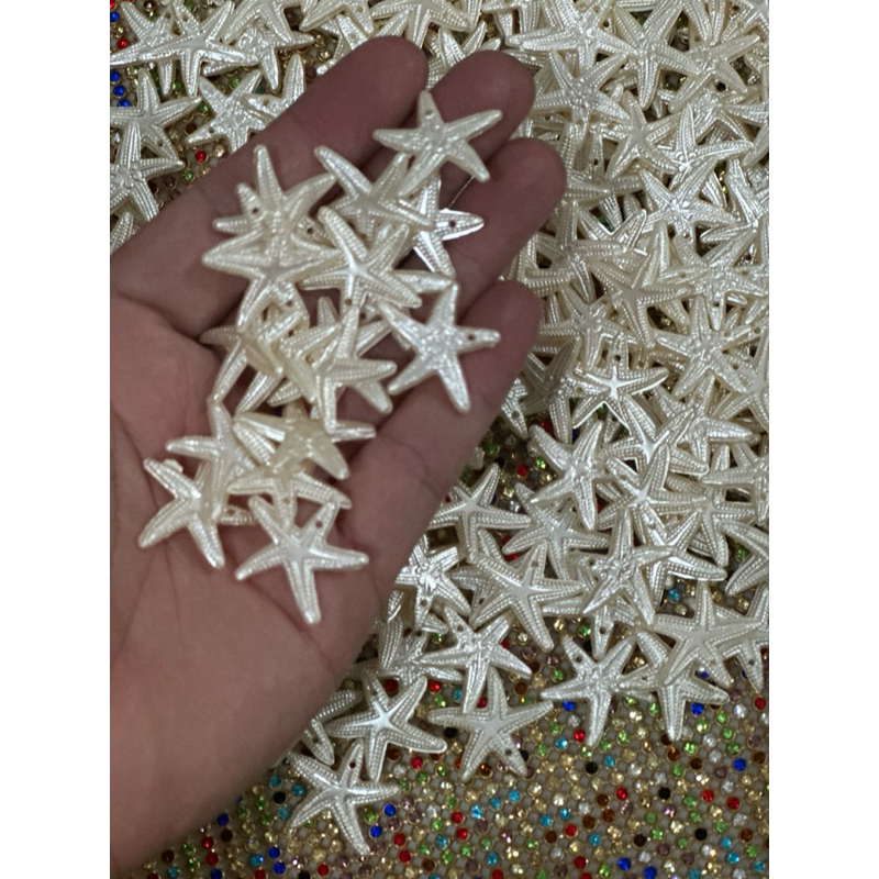 Pingente estrela perolada em resina 20mm-20unid em Oferta na Shopee