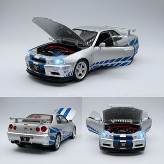 Velozes e Furiosos Nissan GT-R Skyline R34 – Escala 1:24 –Com som, luz e portas que abrem Metal em Oferta na Shopee