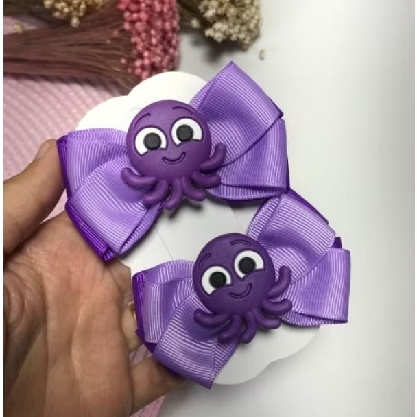 Par de Laços Tema Bolofofos Pow Polvo na Presilha em Oferta na Shopee