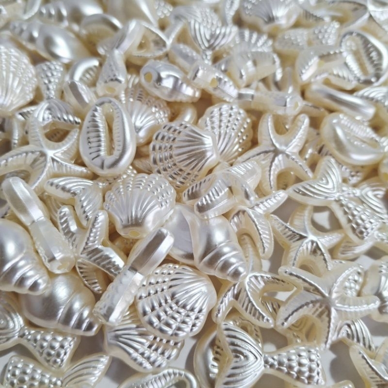 Entremeio Concha e Mar Bege Perolado 18mm Pacote com 50 Gramas em Oferta na Shopee