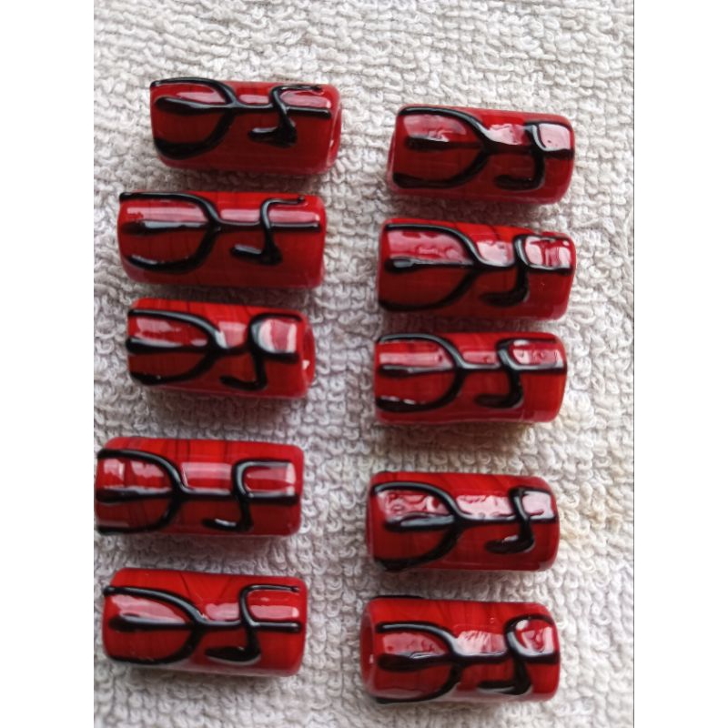 Firma vidro murano pomba-gira vermelha 2cm x 1.2cm kit com 7 unidades