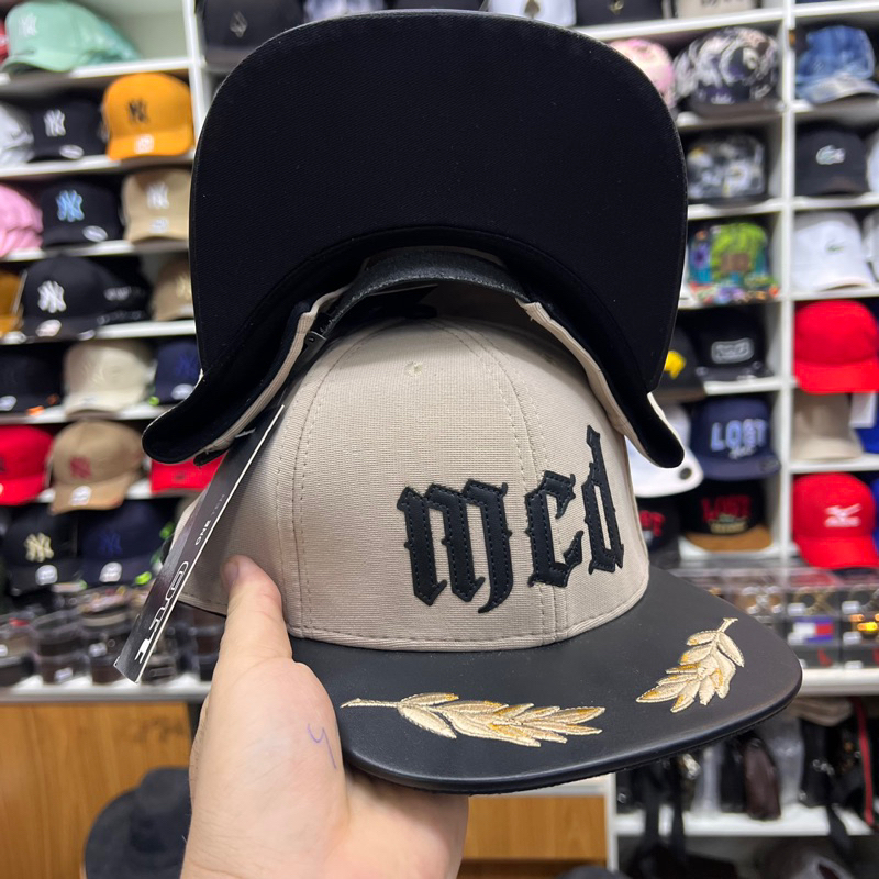 Boné mcd lançamento fitão de couro aba reta