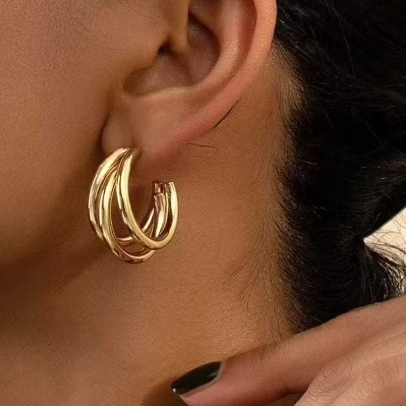 Brinco argola tripla aço inox em Oferta na Shopee