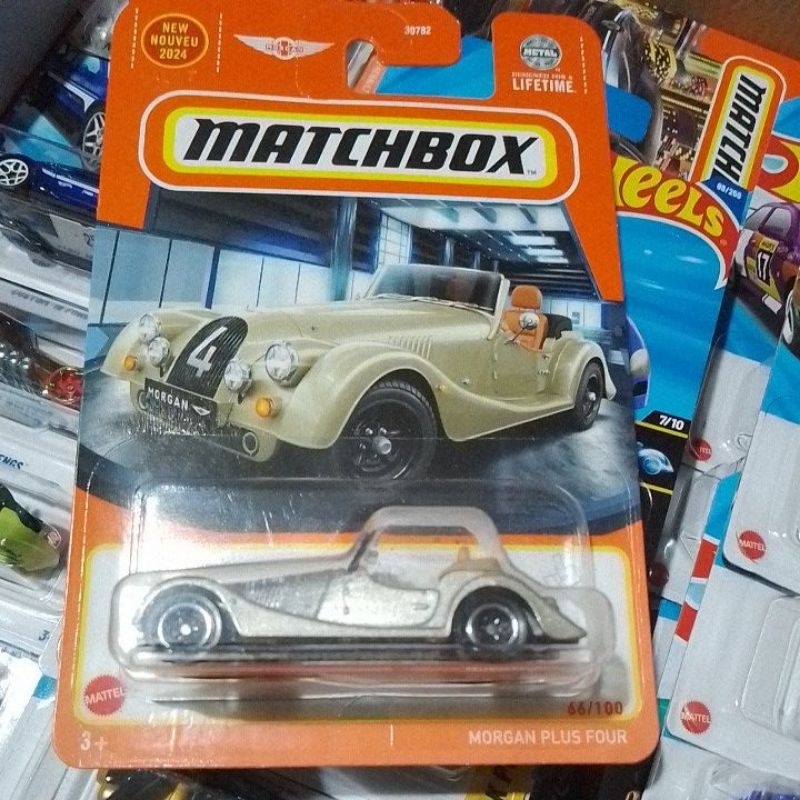 (006 e m001) Miniatura Carrinho Matchbox Morgan plus four 66/100 dourado
