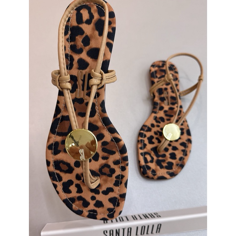 O que é Rasteira Santa Lolla Onça? Guia e Onde Comprar | BuscaProdutos