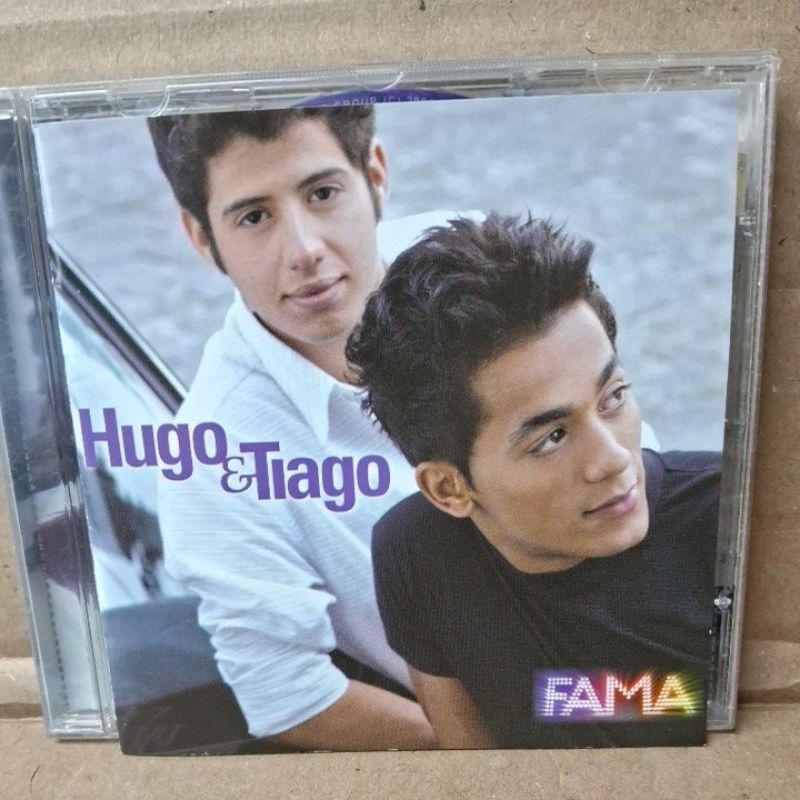 CD HUGO & TIAGO = FAMA ( USADO)LEIA A DESCRIÇÃO.