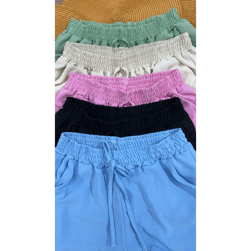 Short Feminino Cintura Alta Soltinho com Bolso Elástico Confortável Verão Moda Tendência