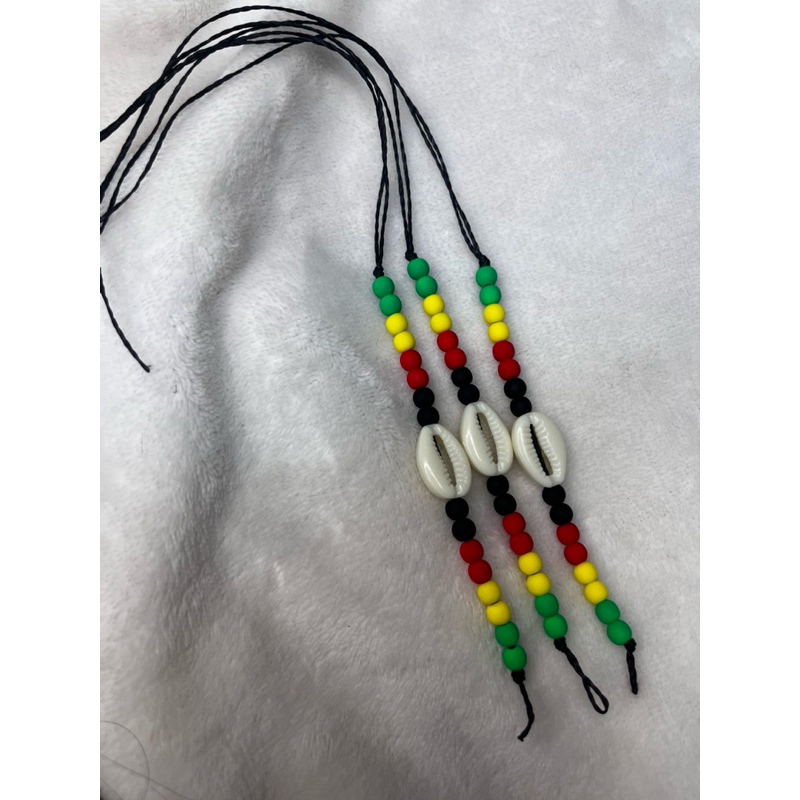 Tornozeleira reggae com búzios