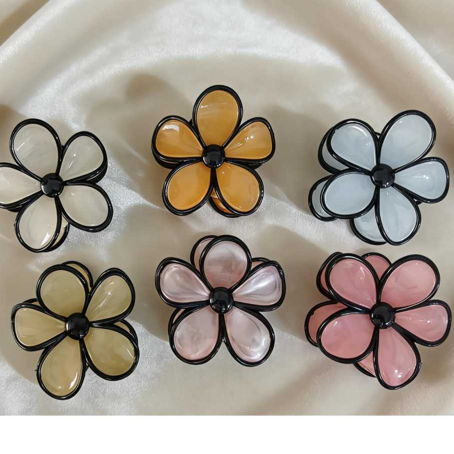 Piranha de cabelo em formato de flor em Oferta na Shopee