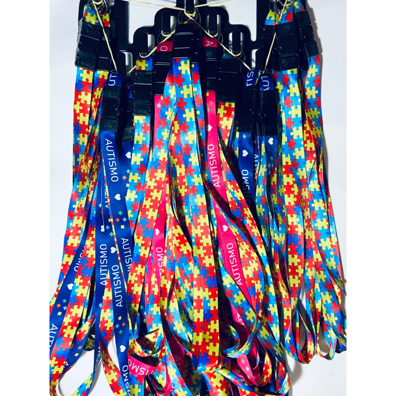 Kit 60 cordões com engate - Autismo azul/rosa + Quebra-cabeça em Oferta na Shopee