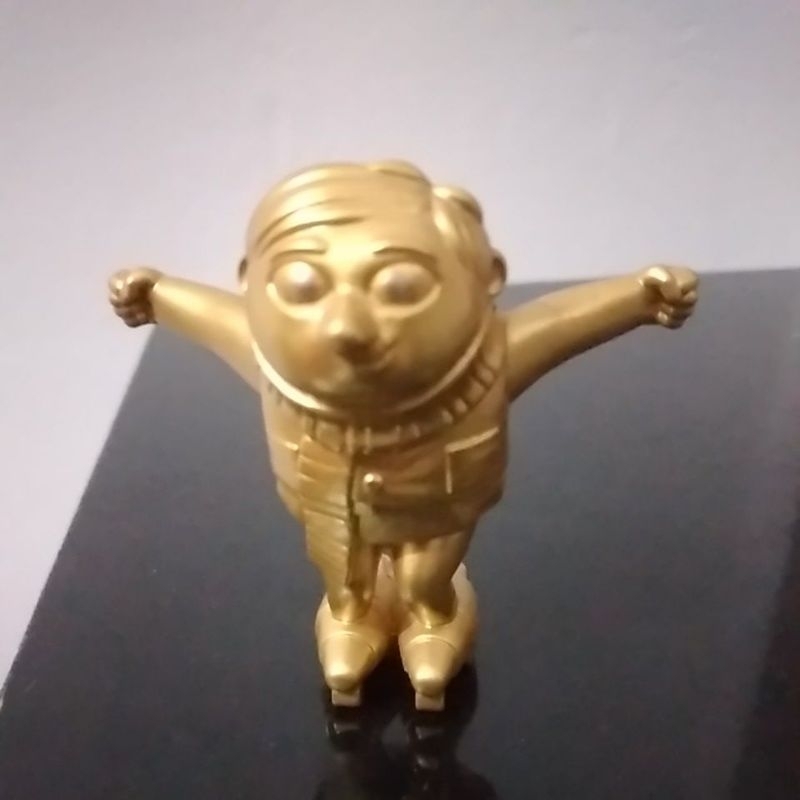 Minion Gru dourado de 2019
