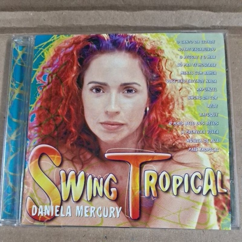 CD- DANIELA MERCURY = SWING TROPICAL ( USADO) LEIA A DESCRIÇÃO