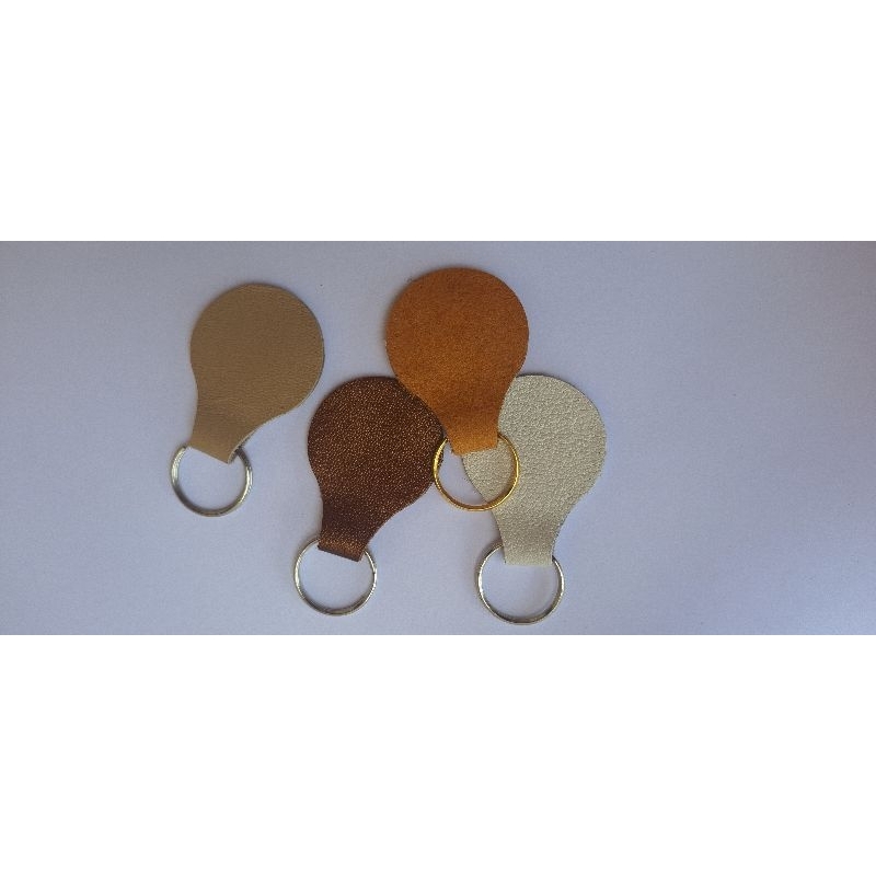 kit 50 chaveiros de couro em cores diferentes. argola 24mm.