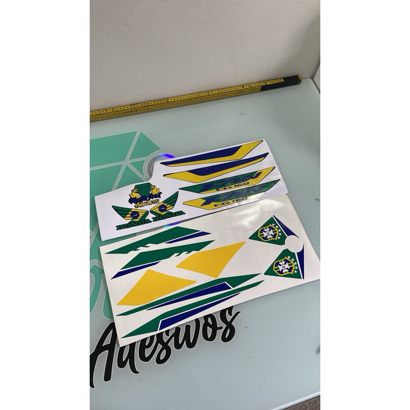 Adesivo Fan 160 e Titan 160 2025/26 Brasil/copa