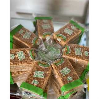 PAÇOCA DE AMENDOIM CASEIRA CREMOSA TRADICIONAL NO ESPETO DOCES LÉO 35 UNIDADES E 90GR CADA em Oferta na Shopee