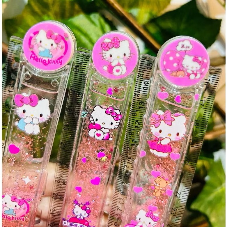 Régua Hello Kitty Dobrável Água Glitter Brilho Transparente 15 ou 30cm Kawaii Papelaria Fofa Escola em Oferta na Shopee