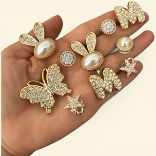kit Pins/ BOTTONS LUXO EM ABS PARA BABUCHES em Oferta na Shopee