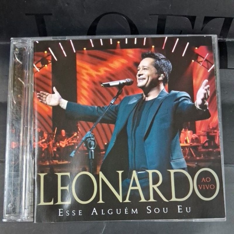CD- LEONARDO = ESSE ALGUÉM SOU EU AO VIVO ( USADO) LEIA A DESCRIÇÃO
