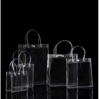 Sacola PVC Transparente com Alça e Botão - Ideal para Brindes, Festas e Casamentos. 12 unidades. em Oferta na Shopee