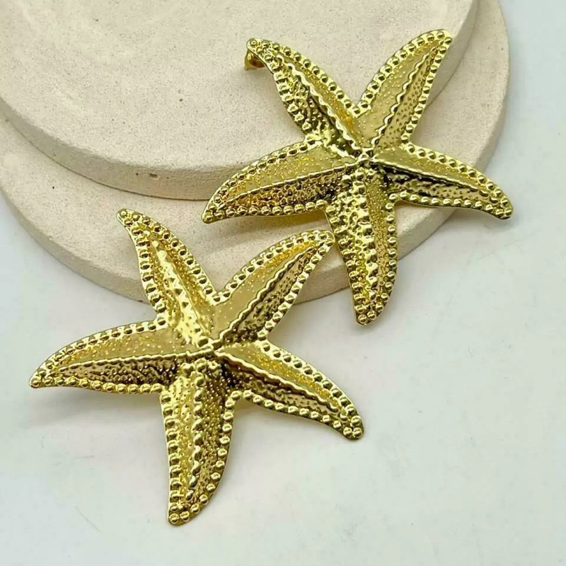 Brinco Estrela do Mar Búzios Tendência Moda Verão dourada