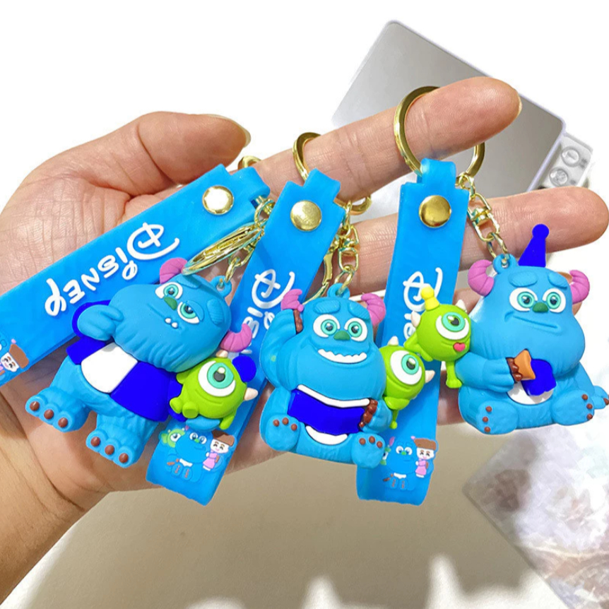 Chaveiro Pingente Universidade Monstros Infantil S.A. Sullivan e Mike Wazowski Porta-Chaves e Bolsas