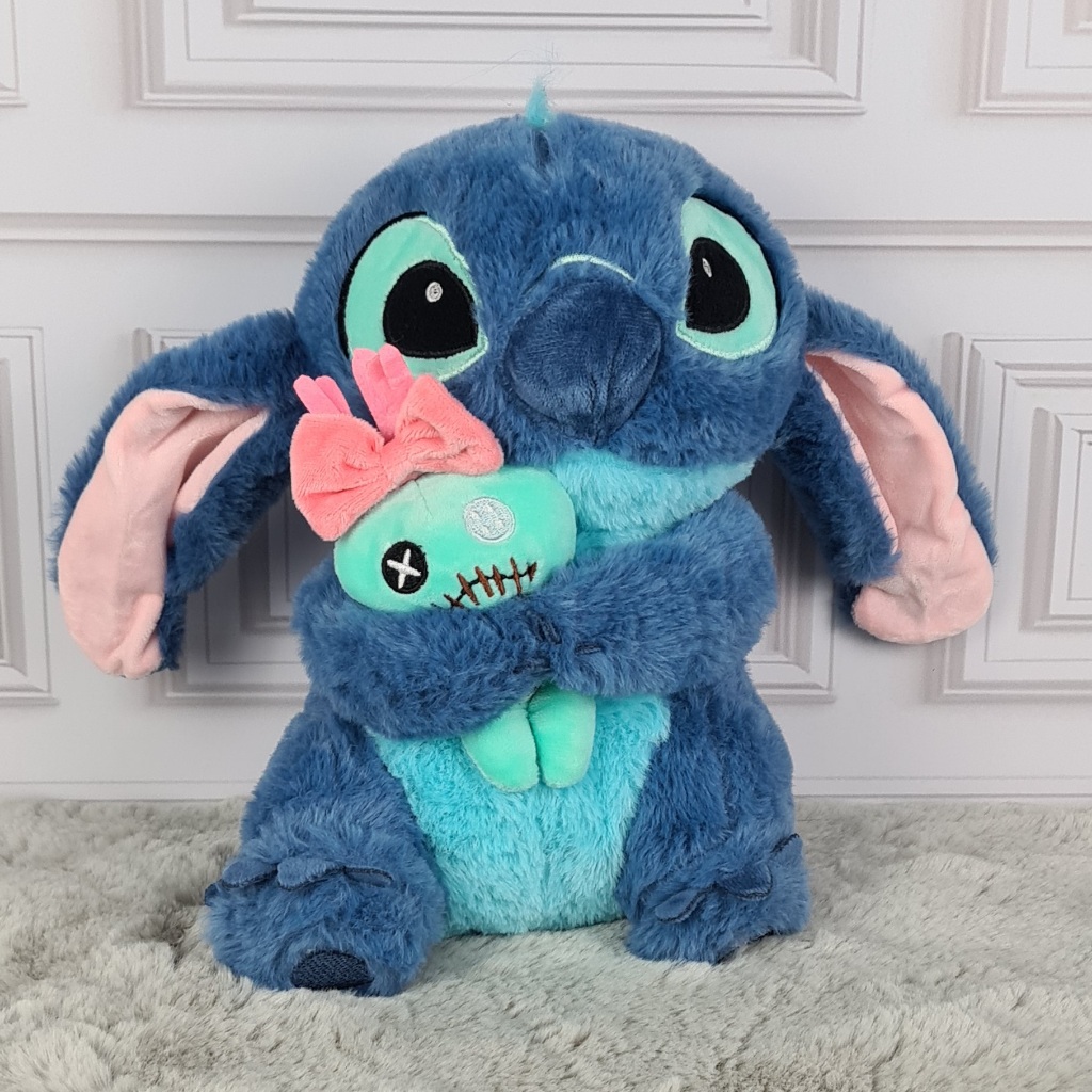 Pelúcia Stitch ou Angel 20cm 25cm 33cm Segurando Pato ou Xepa Brinquedo Kids Desenho em Oferta na Shopee