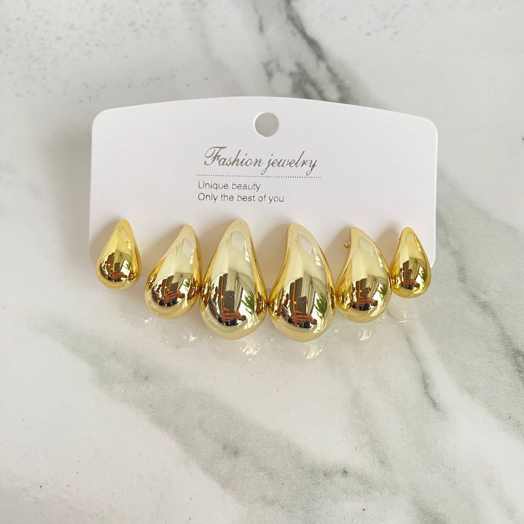 Brincos Gota Dourado – Trio Elegante. em Oferta na Shopee