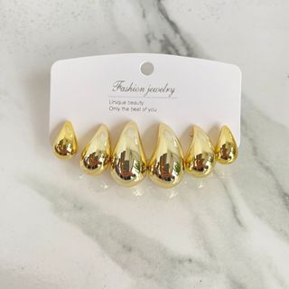 Brincos Gota Dourado – Trio Elegante. em Oferta na Shopee