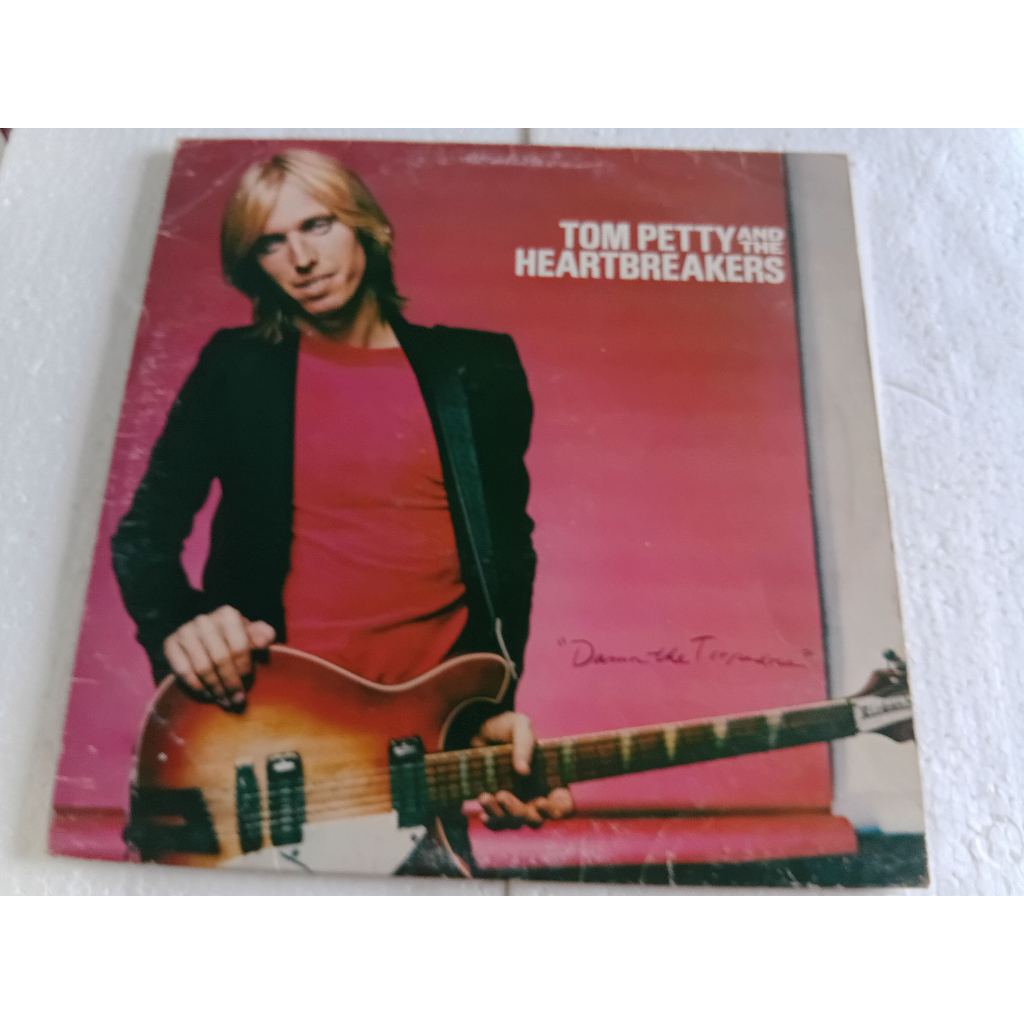 LP tom petty and the heartbreakers damn the torpedoes com encarte importado vinil com alguns pulos capa otima