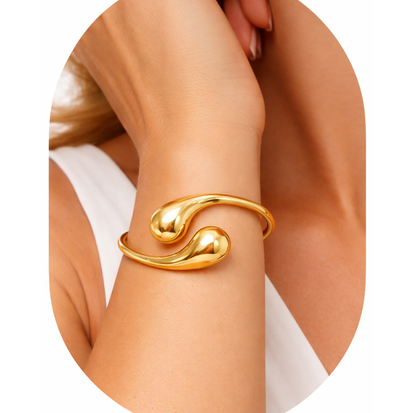 Bracelete Feminino Aberto Com Design De Duas Gotas Em Aço Inox Dourado