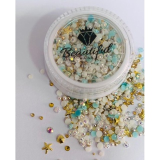 2 unid Mix de pedrarias Fundo do Mar, com  estrelas do mar, pedrarias em tons sereia e meia pérolas com strass. em Oferta na Shopee