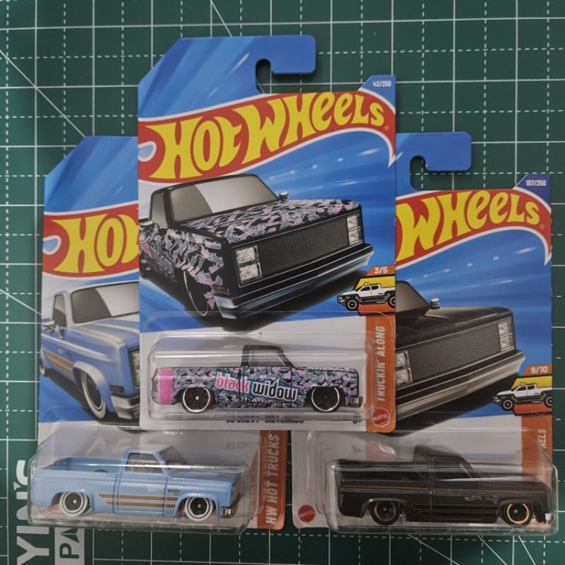 Hot Wheels 83 Chevy Silverado Black Widow Hilux F150 em Oferta na Shopee