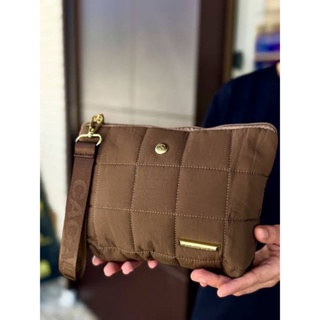 Necessaire Puffer Marrom Cacau Show em Oferta na Shopee